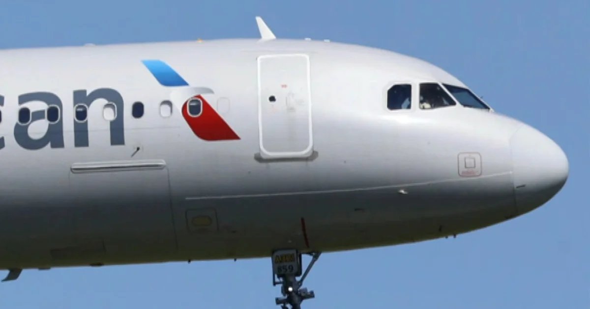 Laptop battery sparks fire on American Airlines flight
