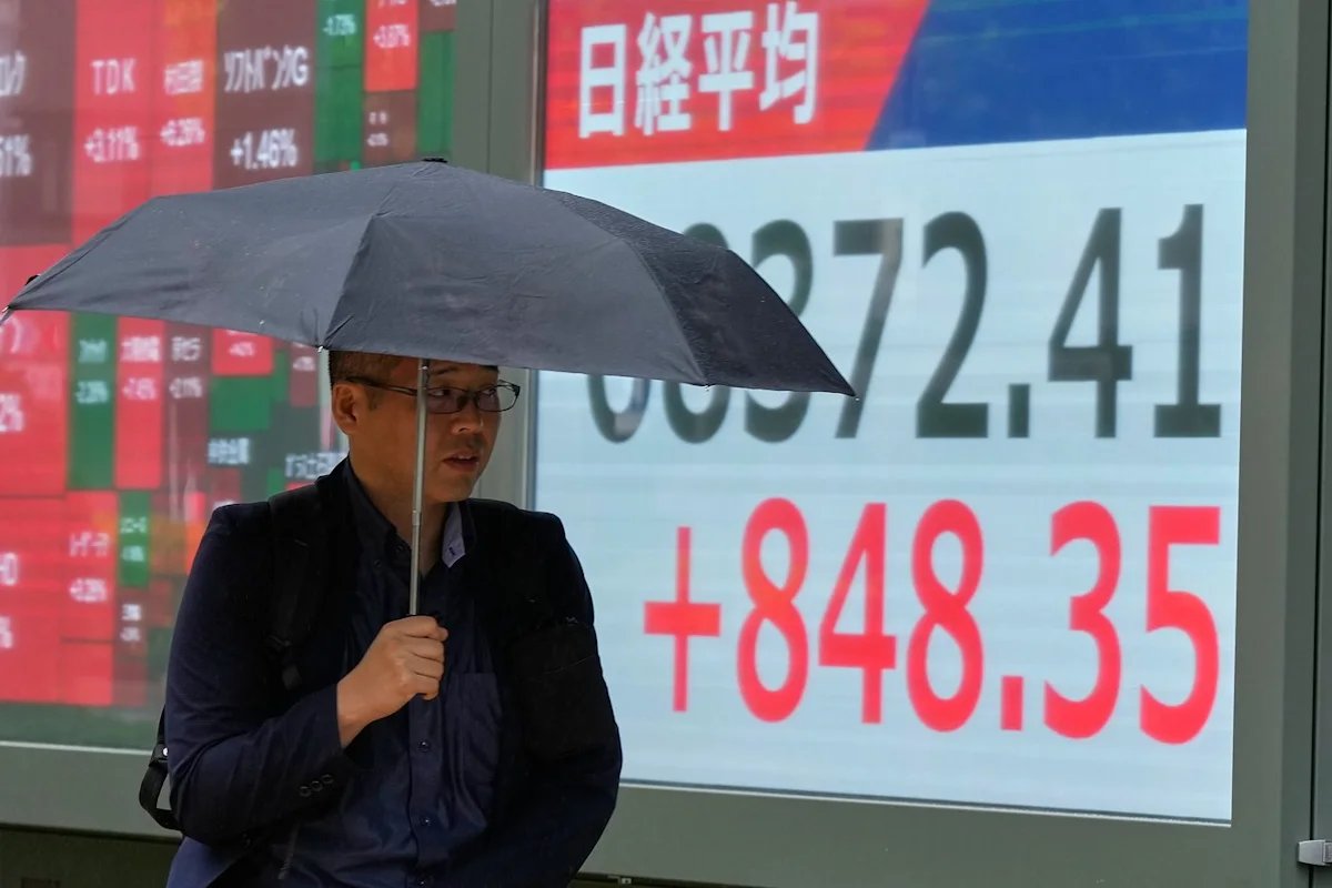 Asian shares mostly rise after buying of AI-related shares leads a rally on Wall Street