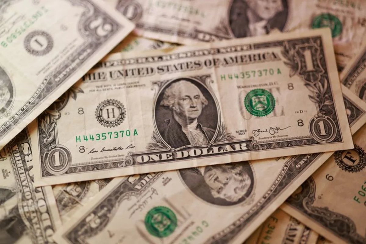 Dollar trading near multi-month lows, restrained by debt nerves