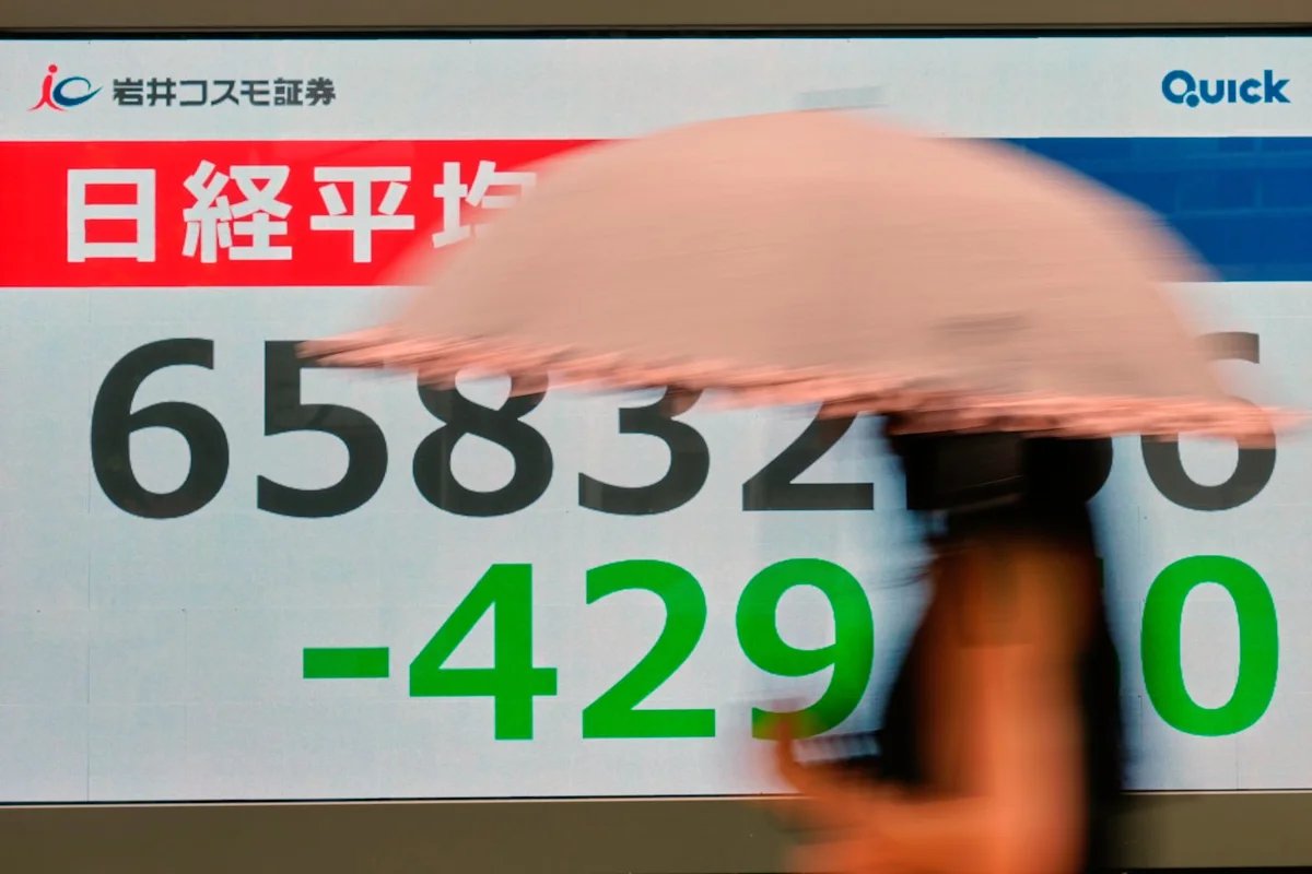 Asian stocks are mixed after Wall Street losses following economic updates