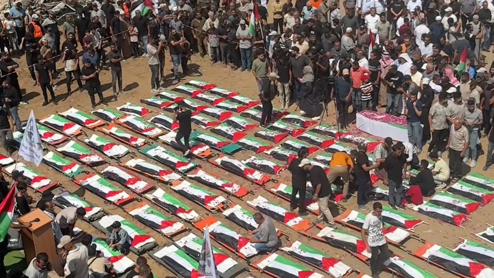 Mass funeral held for 112 members of two Palestinian families | Gaza News