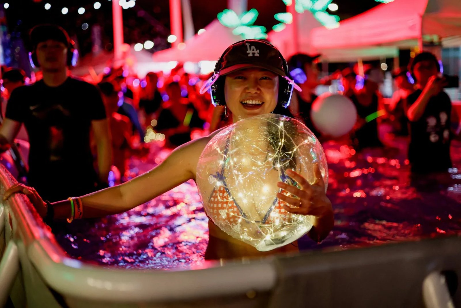 South Koreans beat the heat with ‘silent disco’ pool party | Entertainment