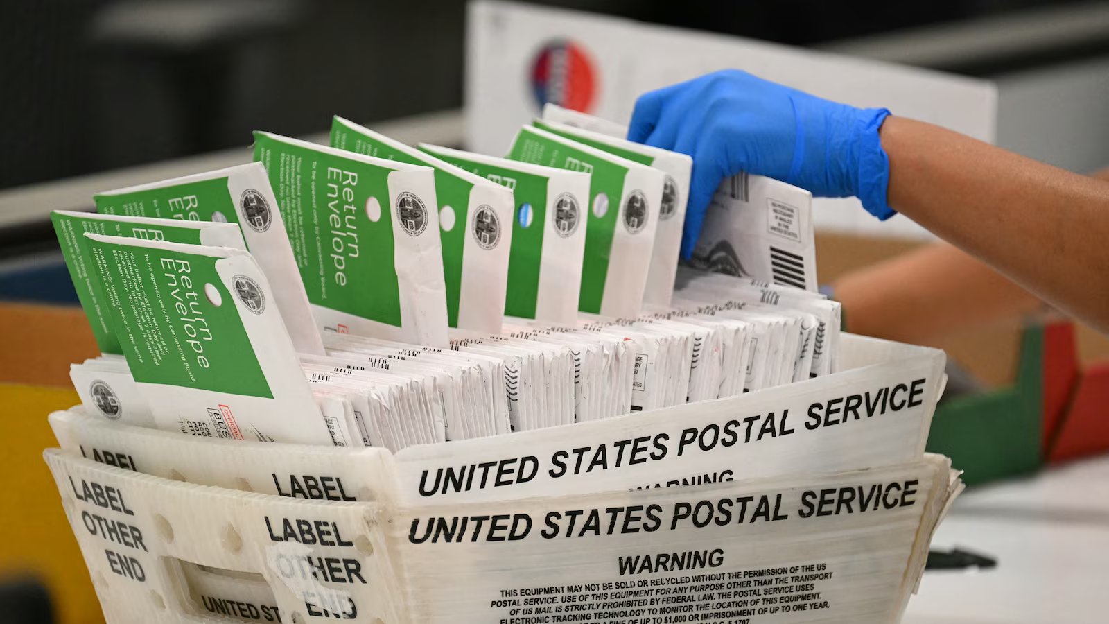 Federal judge temporarily blocks Trump administration’s attempt to restrict mail-in voting