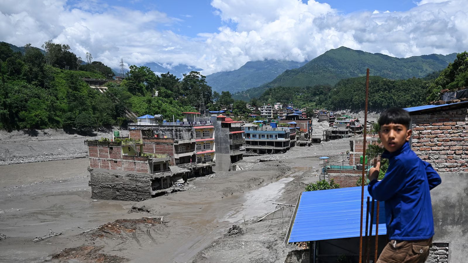 Hundreds dead as nearly 1,000 remain missing in massive Nepal-Tibet flood