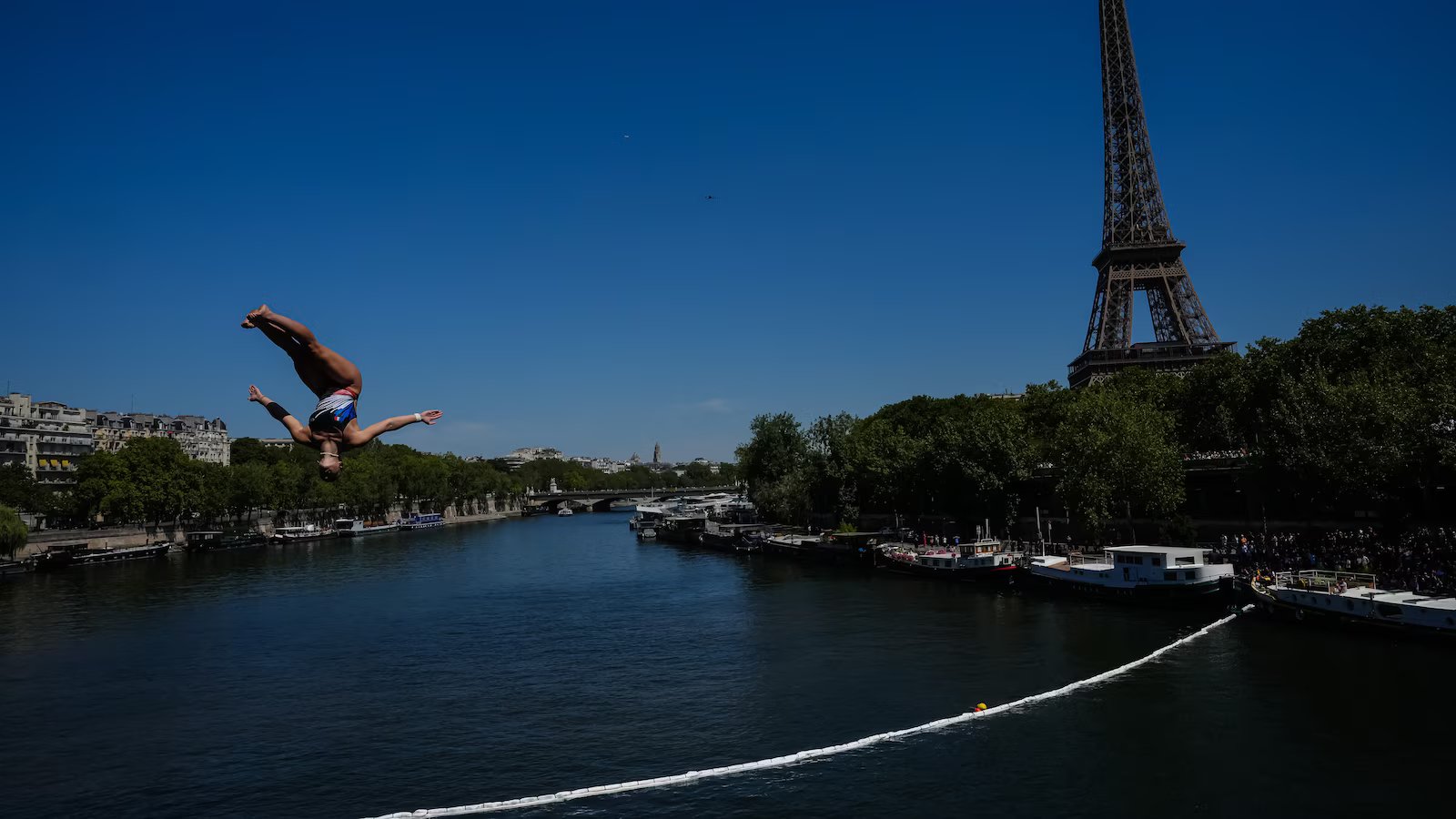 High divers take the plunge in the Seine in a new test of Paris’ reclaimed river