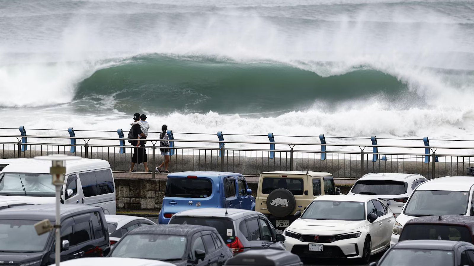 Tropical storm hits Tokyo area, leaving thousands without power before moving west