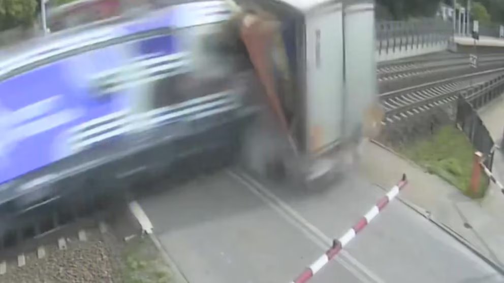 WATCH:  Video shows train in Poland slam into big rig stuck on tracks
