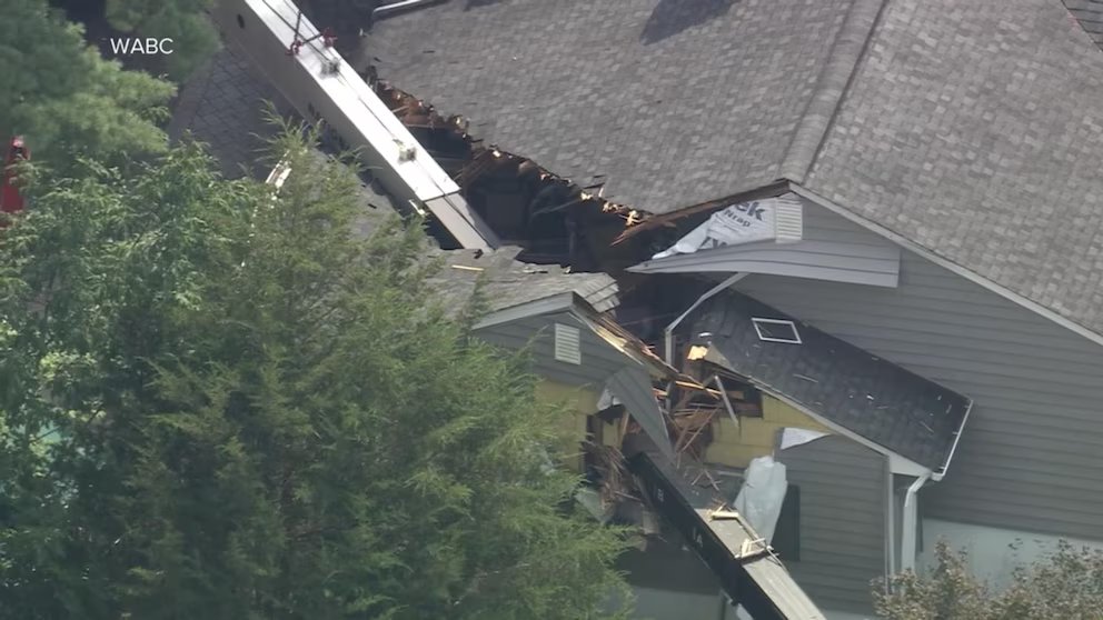 WATCH:  Large crane collapses onto New Jersey homes
