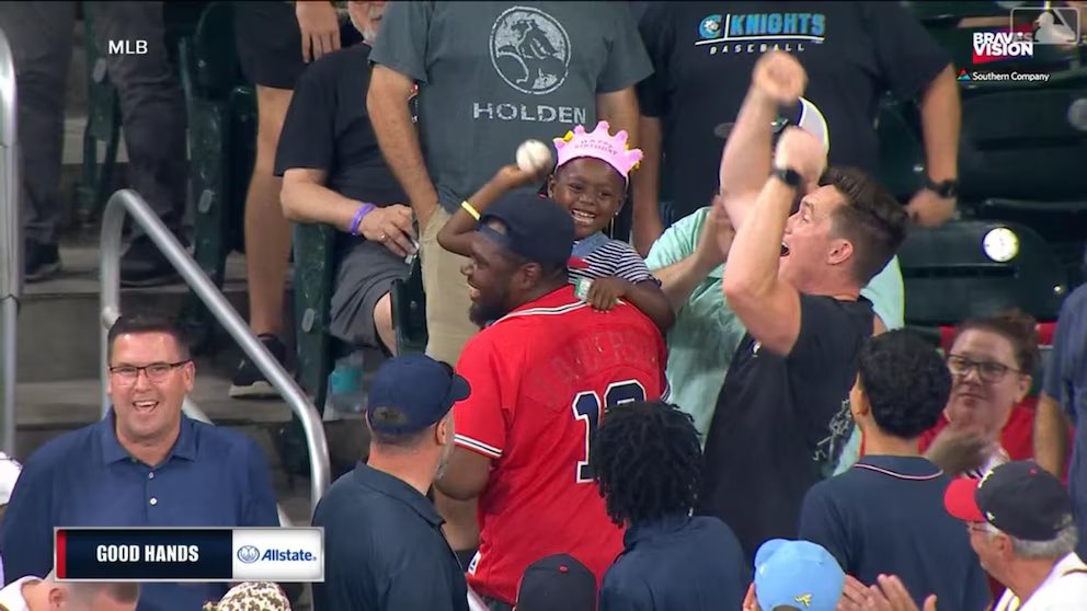 WATCH:  Birthday girl shows off her arm after catching home run at Braves game