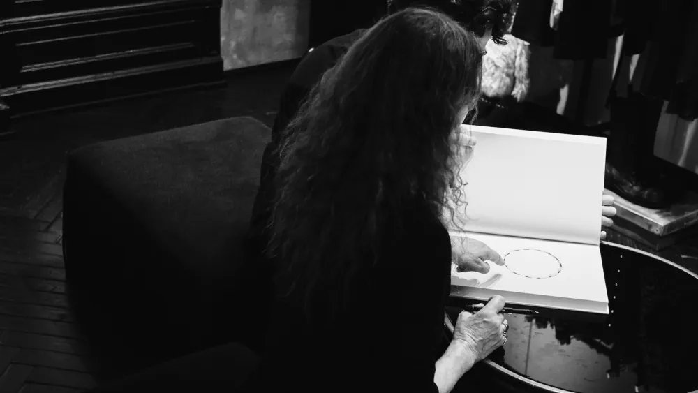 Ann Demeulemeester Attends Book Signing for Print Book in Milan