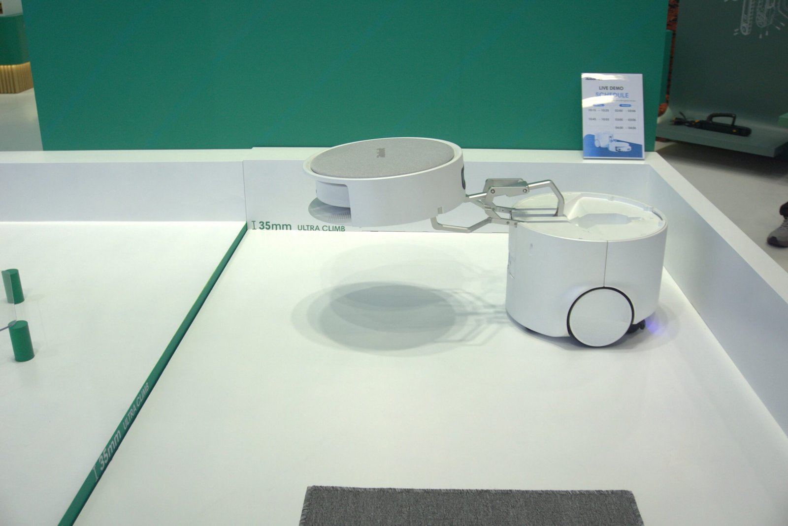I Watched a Floor Washing Robot Mothership Deploy a Roomba Using a Mechnical Arm