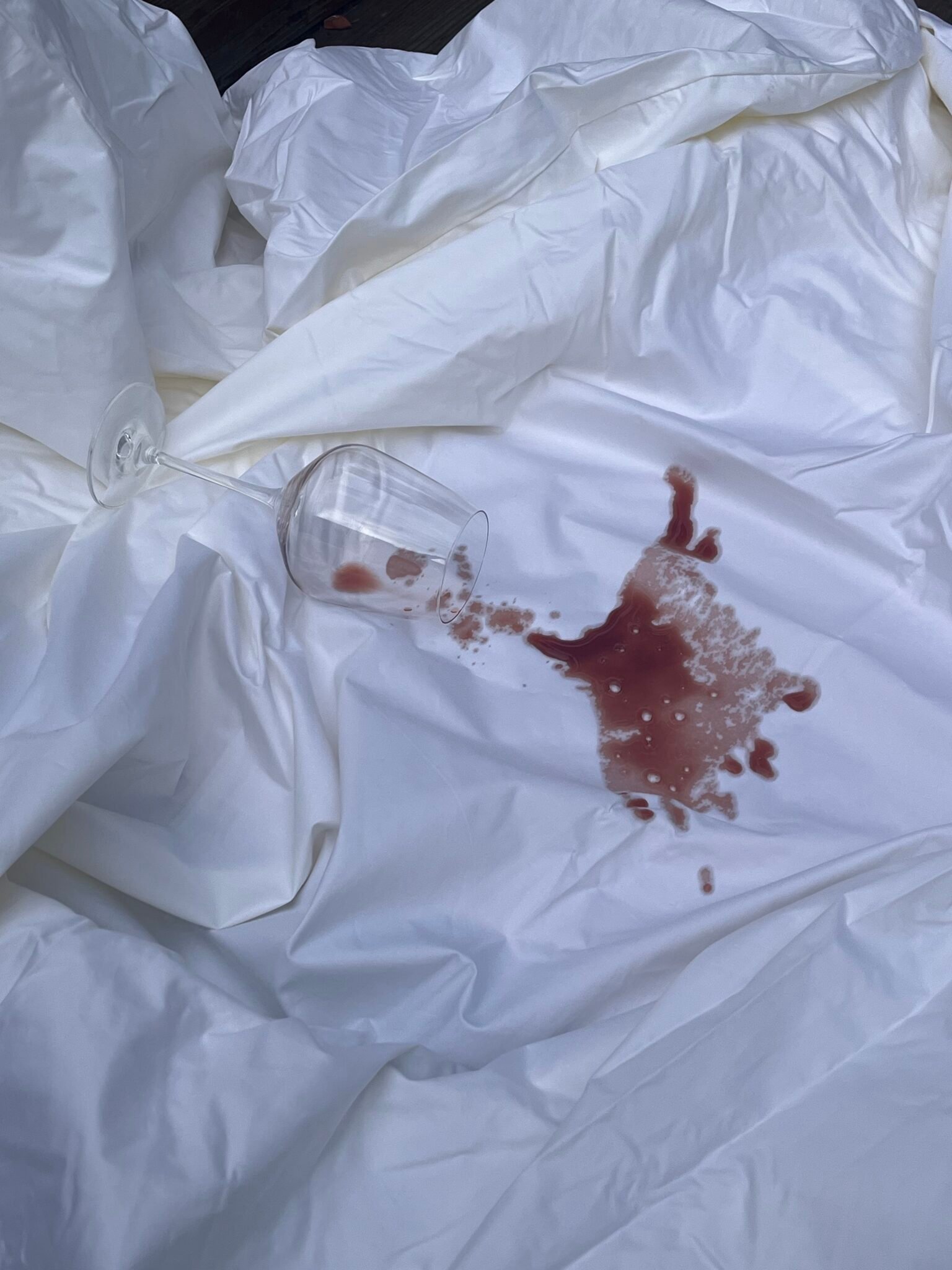 I Spilled Wine On 11 Organic Mattress Protectors—Here’s What Worked