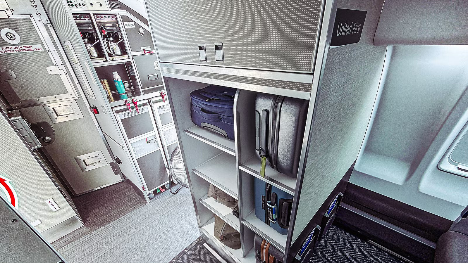 The Real Reason United Airlines Replaced First Class Overhead Bins With A Luggage Closet On Its New Regional Jet