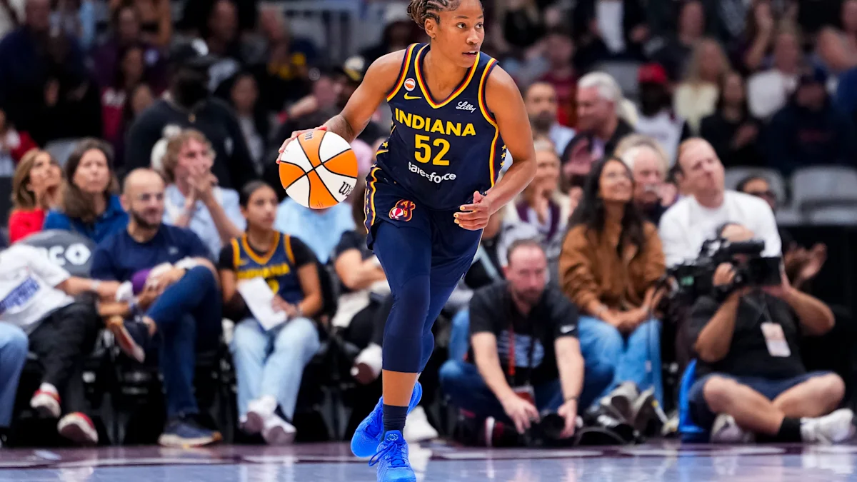 Fever guard Ty Harris carried off court after sustaining ankle injury