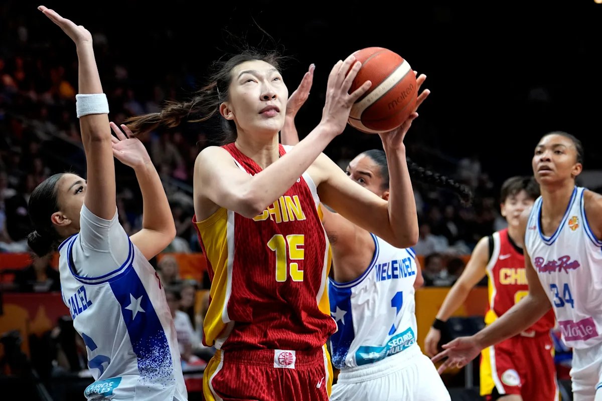 Han Xu powers China past Puerto Rico 75-72, sending them to a quarterfinal matchup with France