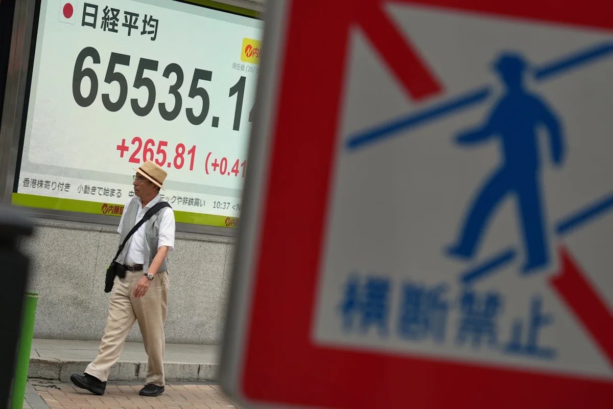 Asian shares are mixed as Brent crude approaches $100 a barrel