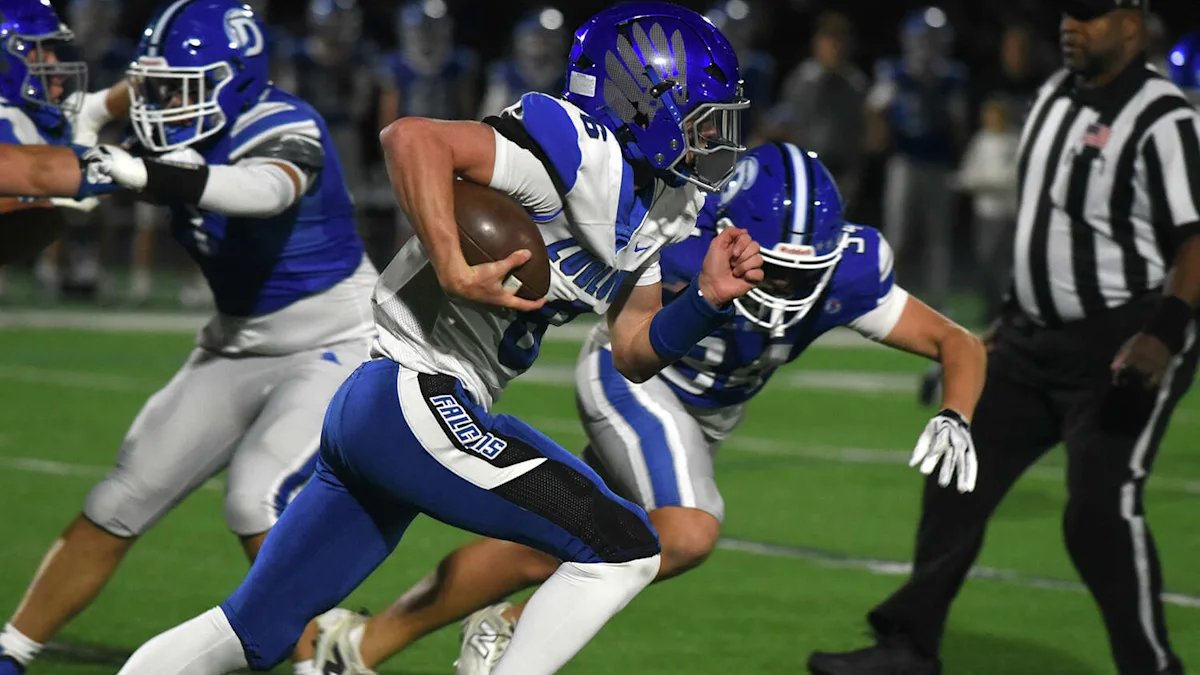 Ludlowe football gets first win over Darien behind quarterback Ryan Love and defense