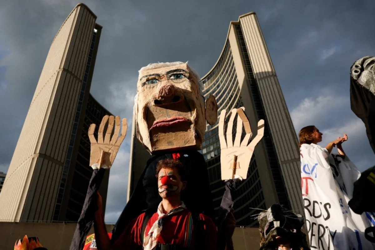 Hundreds march in Toronto against Carney’s investment summit