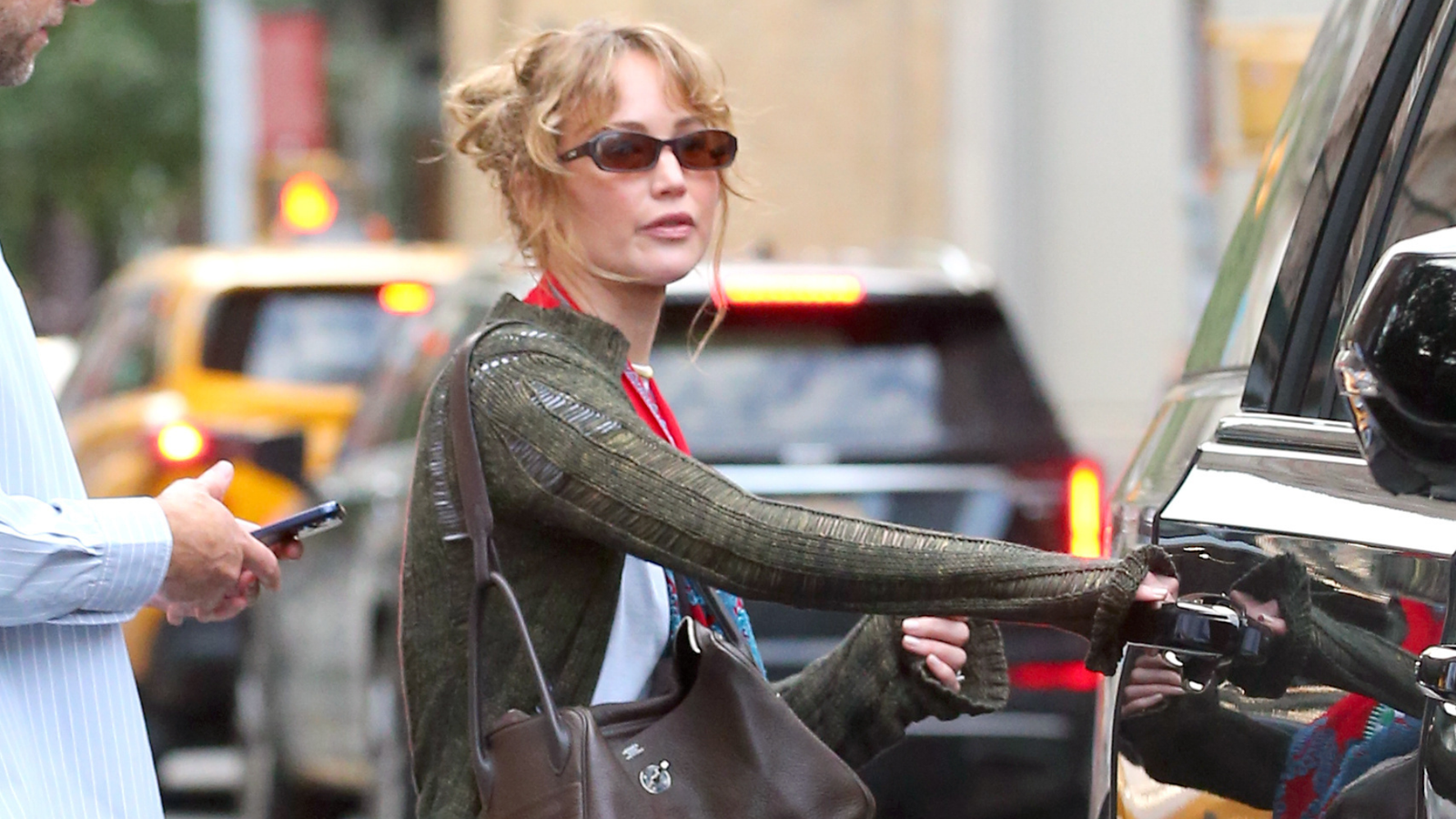 JLaw Just Elevated Her Low-Key Outfit With This Playful Flat Shoe