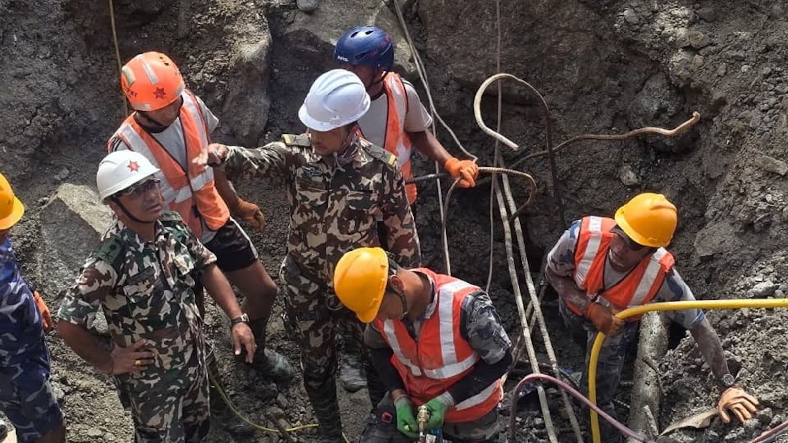 2 people rescued alive from tunnel after deadly Nepal-Tibet flash flood