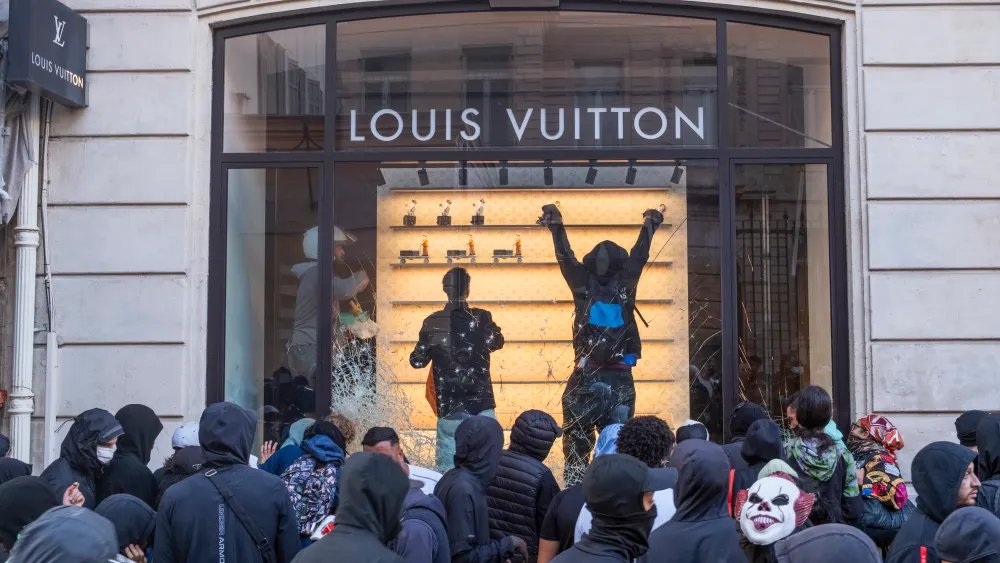 French Retailers Hit by Looting Amid Unrest Across Major Cities