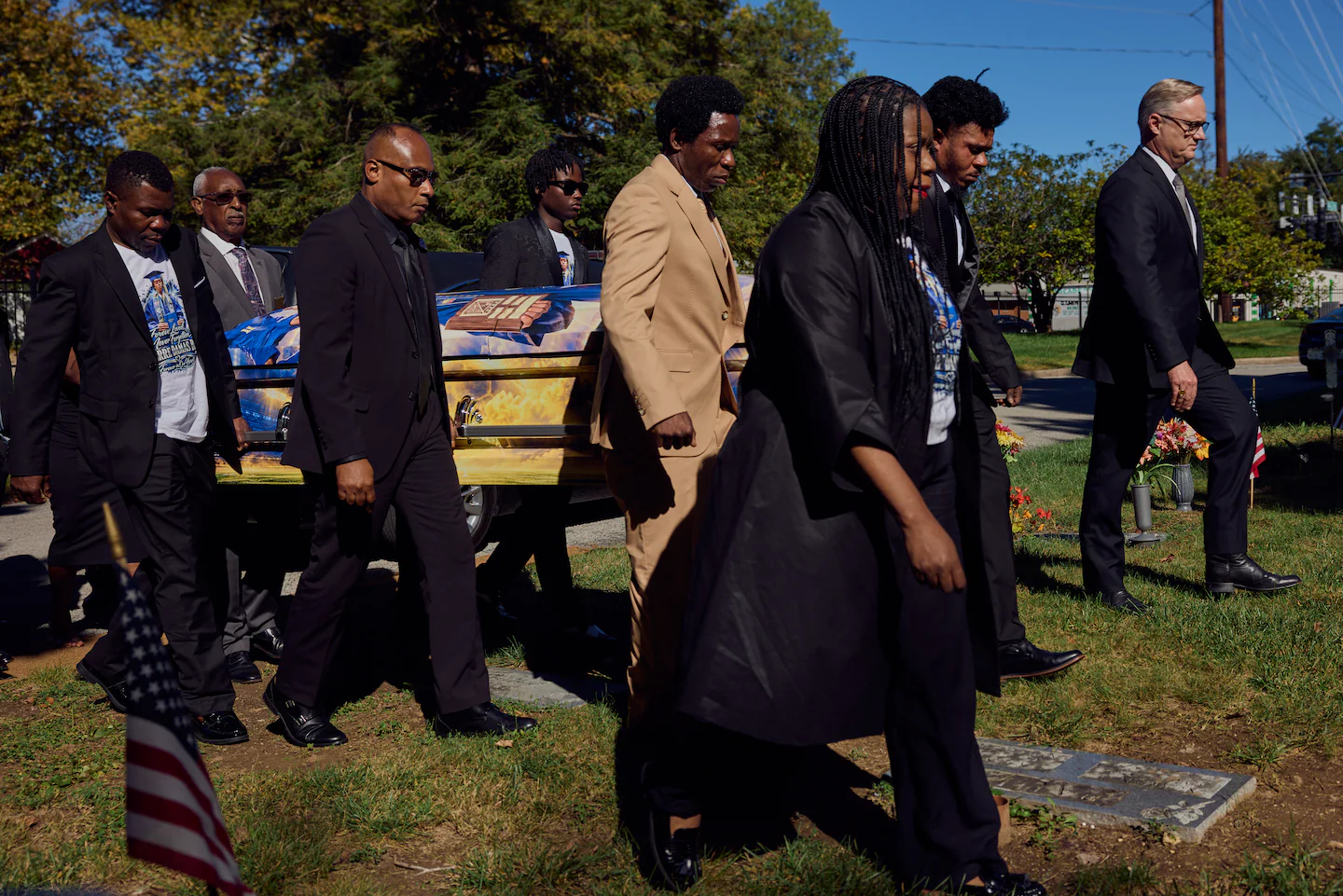 As Trump rallies his base in Ohio, a Haitian migrant is laid to rest nearby