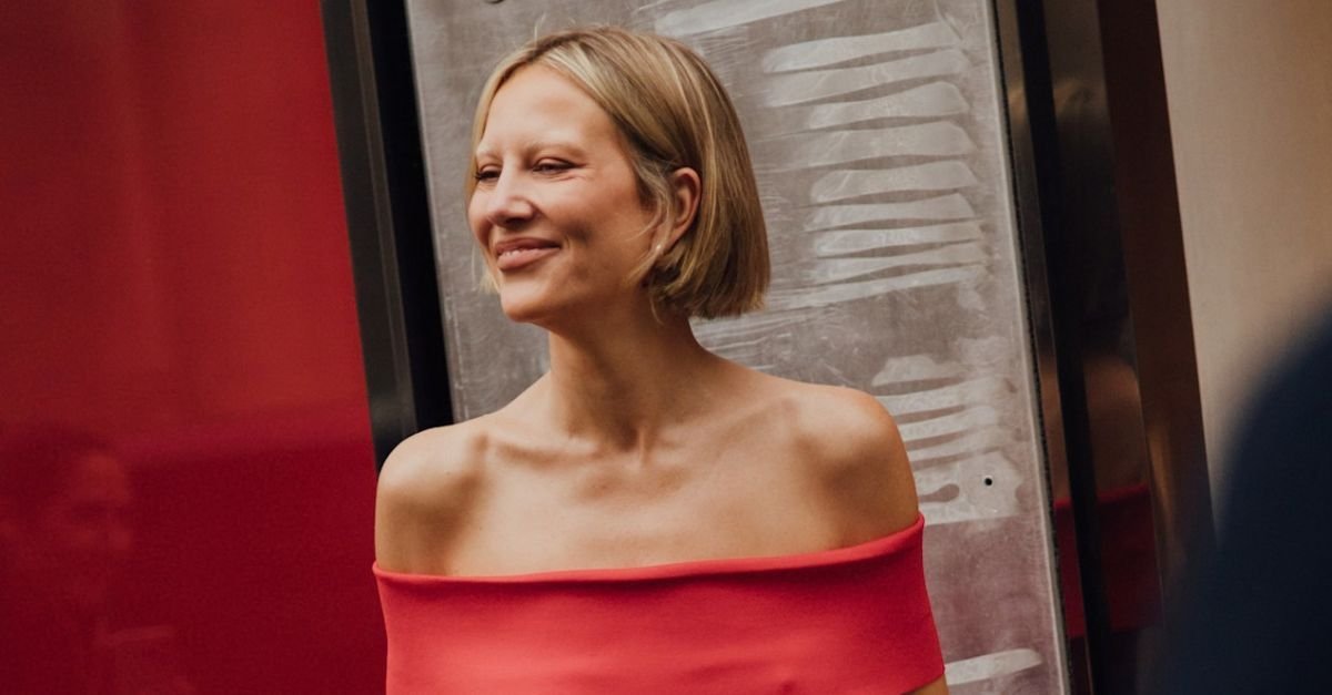 Chic Parisians Keep Styling Jeans With the Red Colour Trend