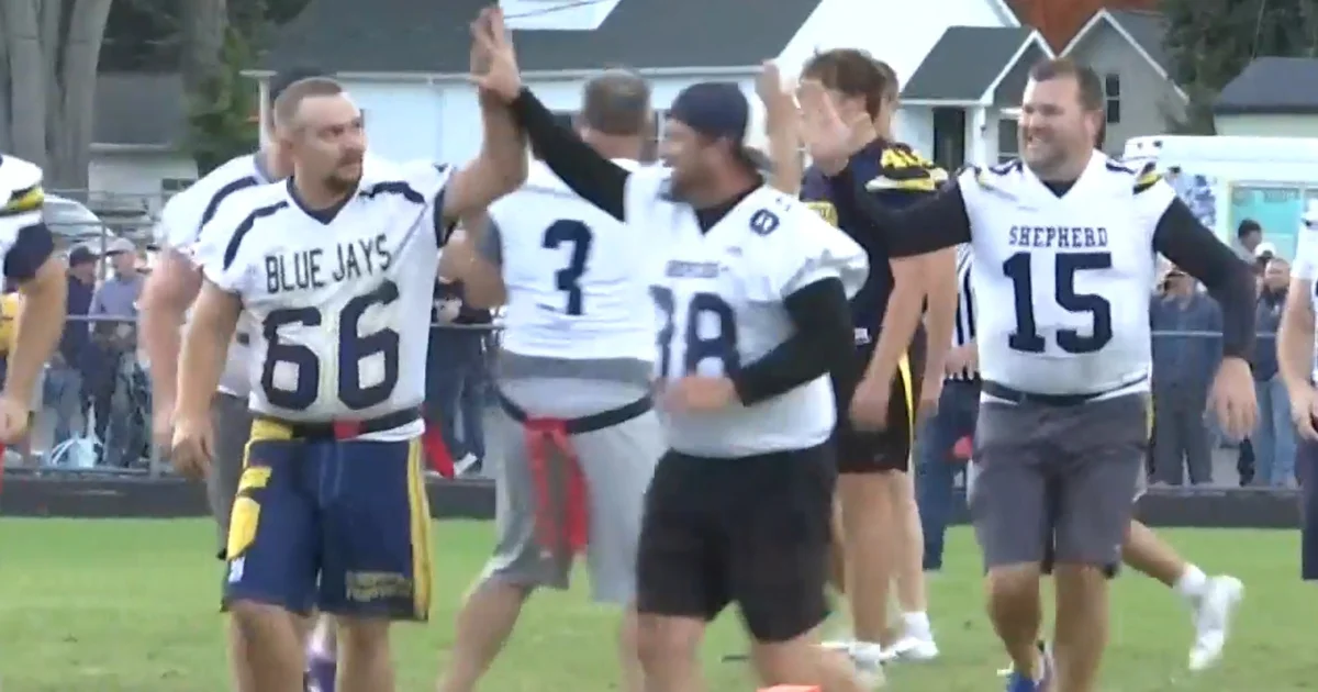 Michigan homecoming game pits kids versus parents after opposing school can't field team