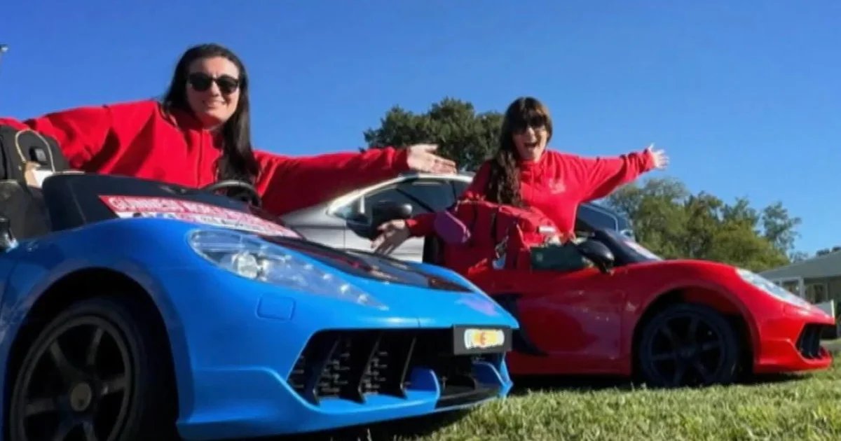 Women trying to ride toy cars toward a Guinness World Record