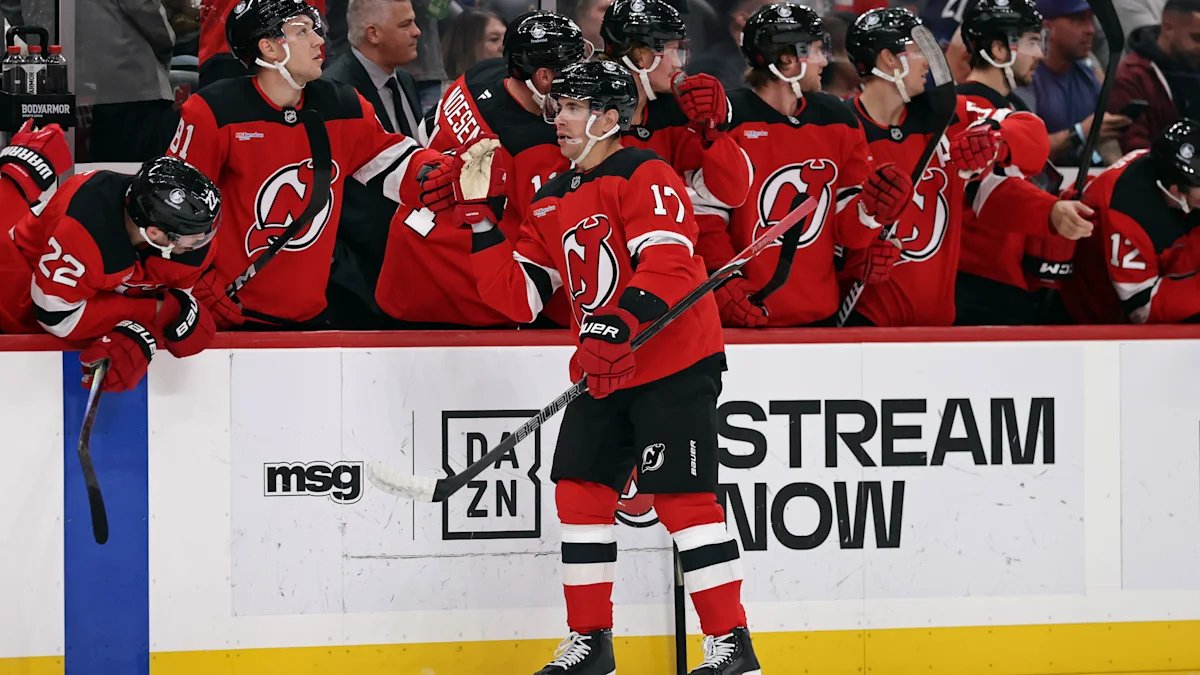 Devils score four goals in just over five minutes on the way to routing the Rangers 7-1