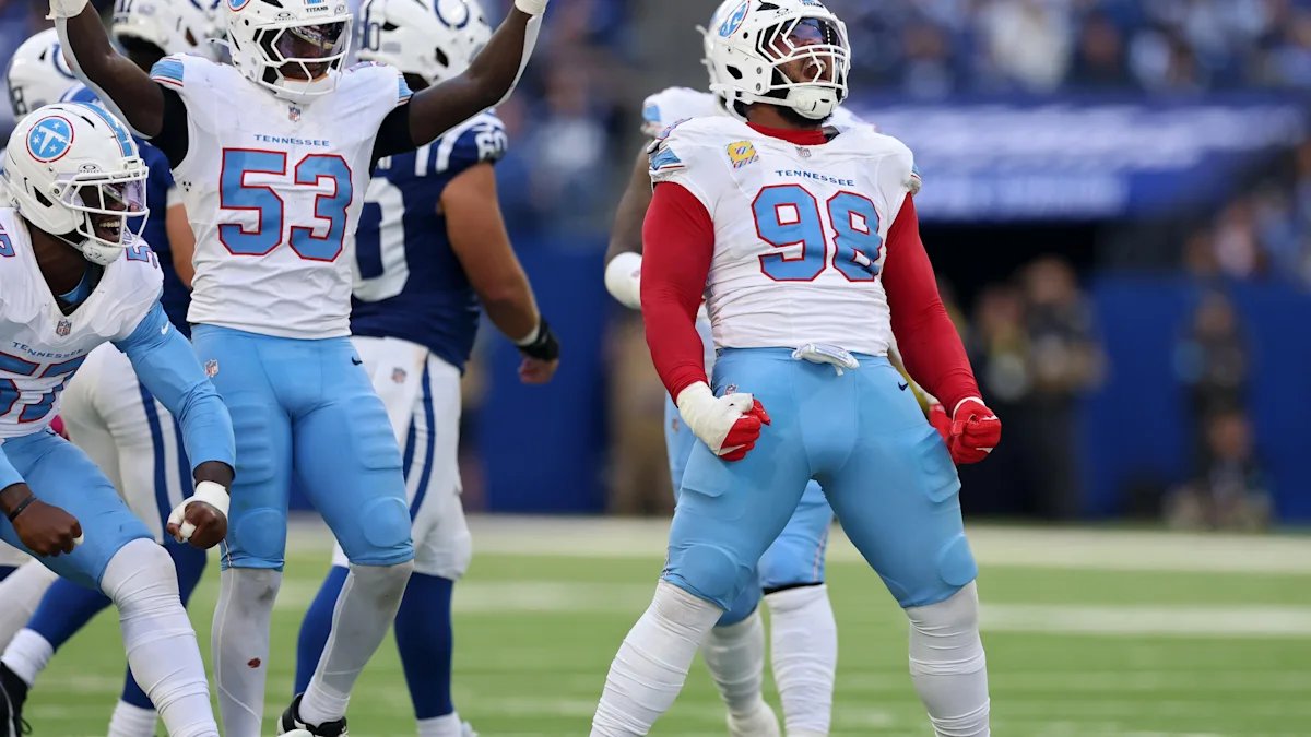 Titans get first win 26-20 over Colts
