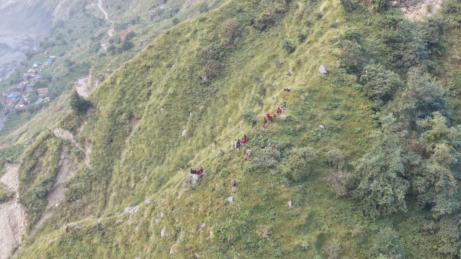 Rescue helicopters race to flood-hit Nepal villages as 5 reported missing