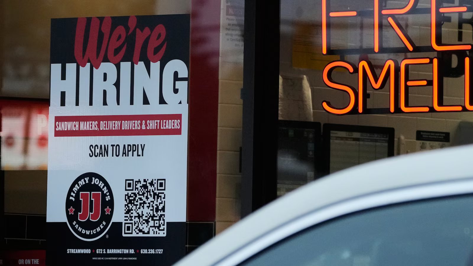 Americans filing for jobless aid remain at historically low levels below 200,000