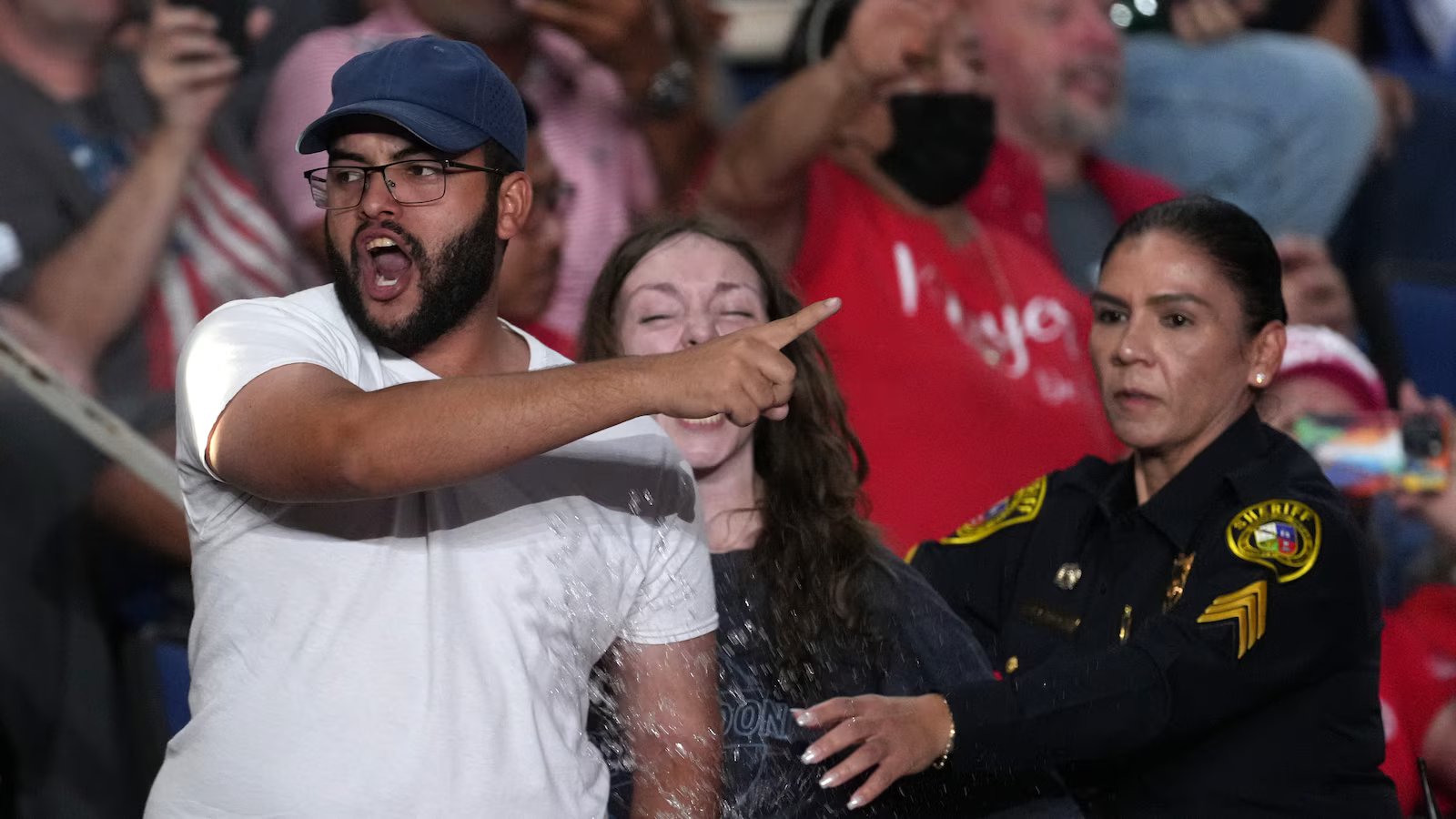 Trump interrupted by protesters as he fights to rally Texas voters